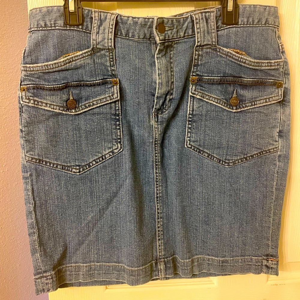Classic blue jean skirt, hits above the knee.